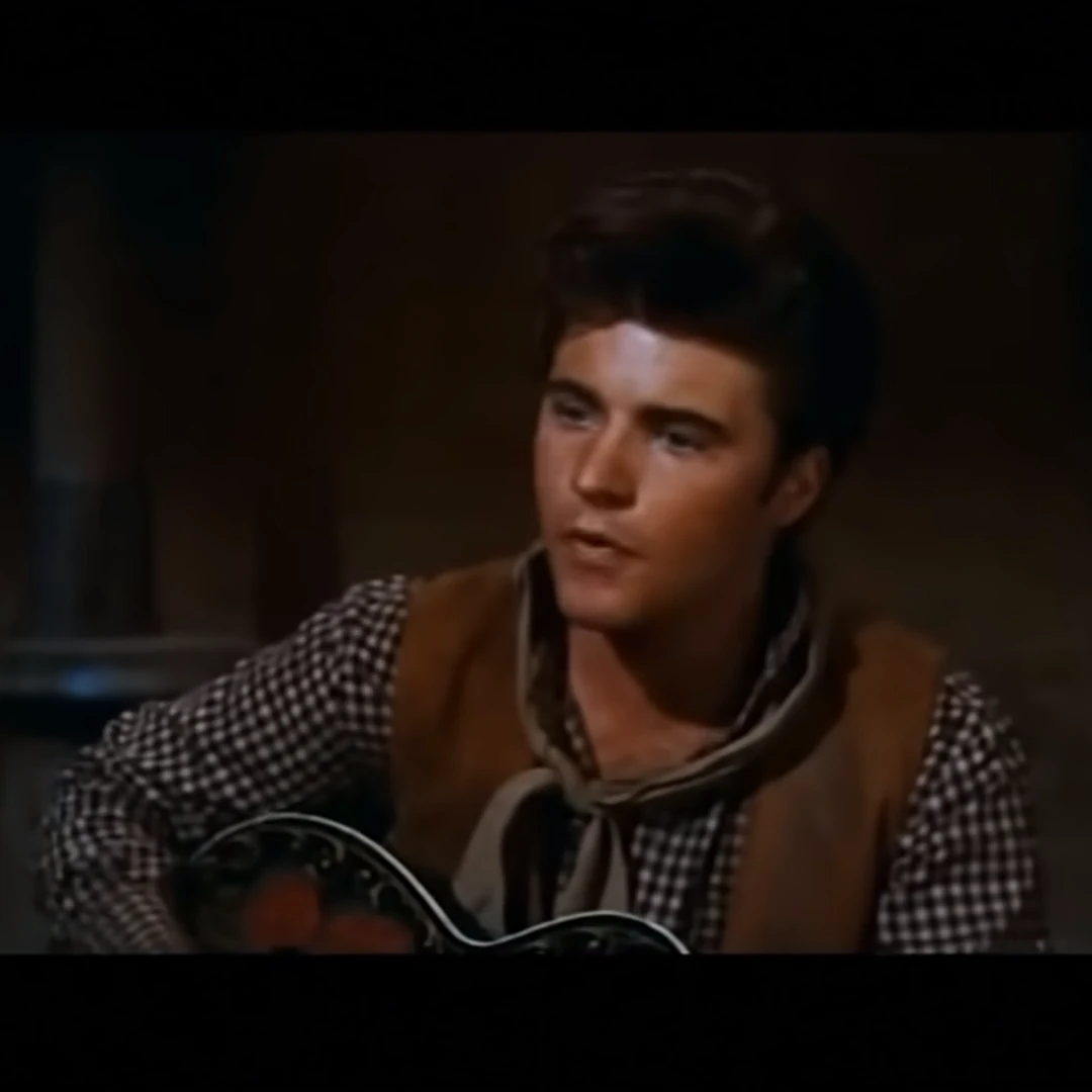 Dean Martin, película: Rio Bravo (1959) Director: Howard Hawks. webp